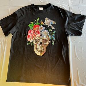 RETURN TO SENDER MENTAL BLACK WITH SKULL FLORAL DESIGN LARGE